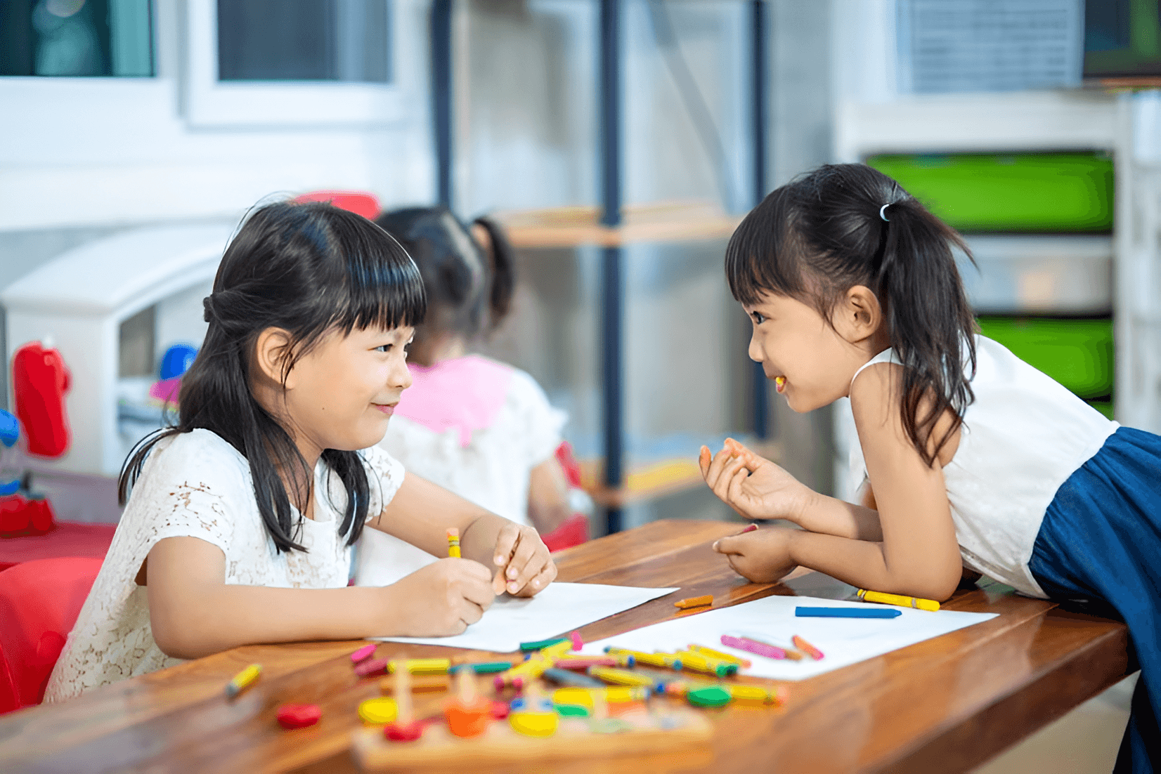 A young learner experimenting with a creative activity